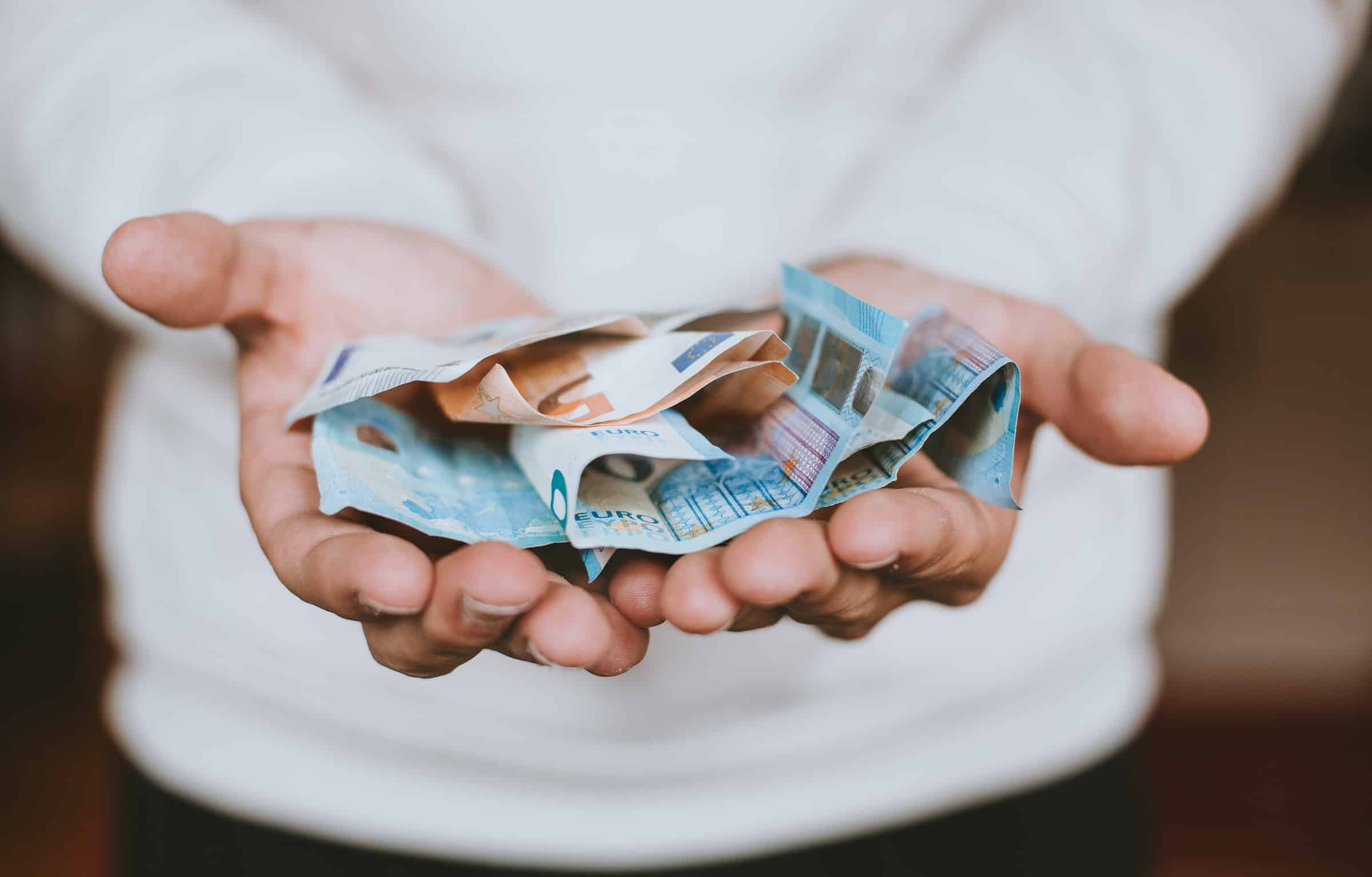 Person holding money